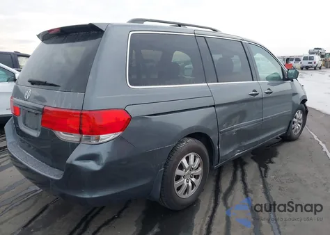 2010 Honda Odyssey Exl z USA, uszkodzony, nr VIN 5FNRL3H79AB114308